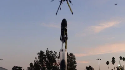 Design and Autonomous Stabilization of a Ballistically-Launched Multirotor featured image
